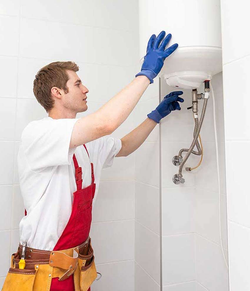 Certified Water-heater-company plumber installing water heater
